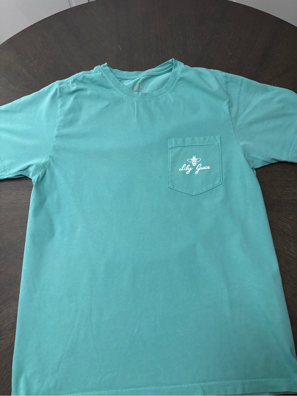 Lily Grace Women's Short Sleeve Pocket Tee in Teal